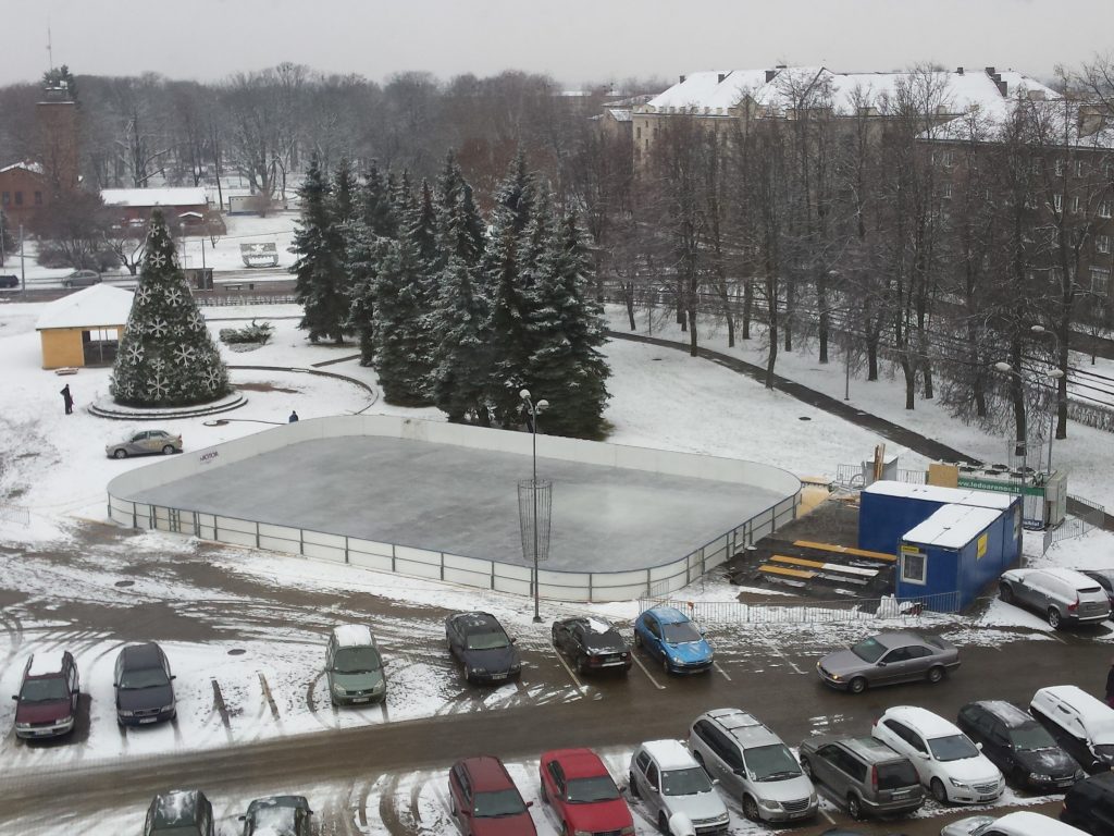 Daytime aerial view of the seasonal ice rink at Unity Square in Daugavpils
