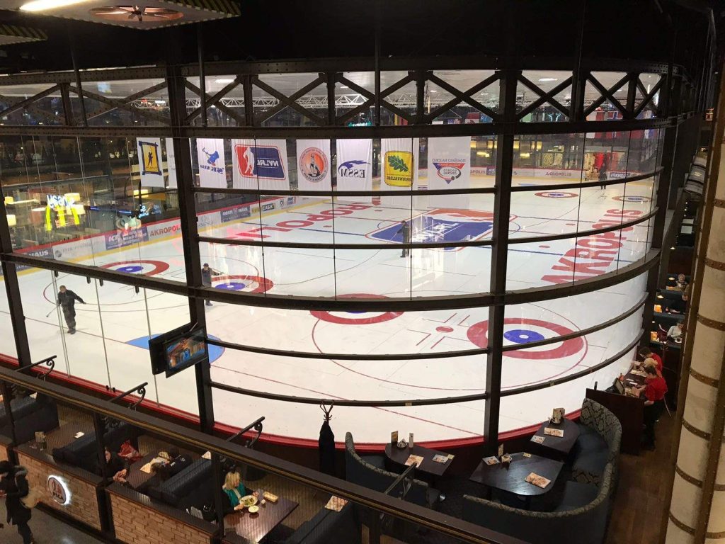 Wide view of the permanent indoor ice arena at Siauliai Akropolis