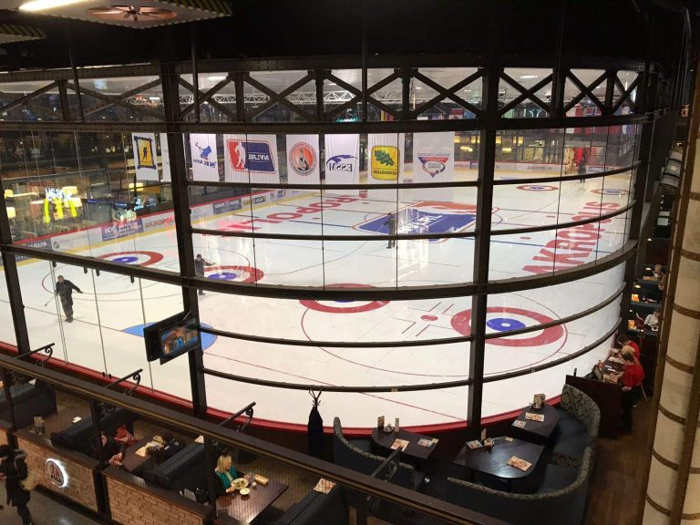 Wide view of the permanent indoor ice arena at Siauliai Akropolis